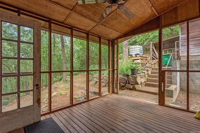 Nestled on 5 private wooded acres, this custom log home offers - photo 39