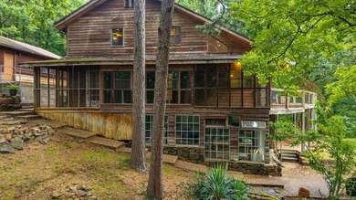 Nestled on 5 private wooded acres, this custom log home offers - photo 40