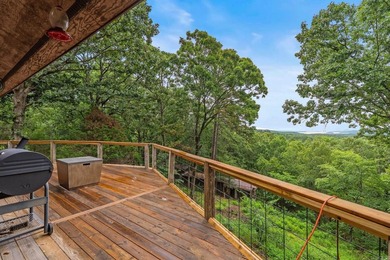 Nestled on 5 private wooded acres, this custom log home offers - photo 43