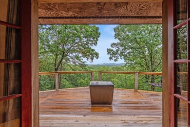 Nestled on 5 private wooded acres, this custom log home offers - photo 44