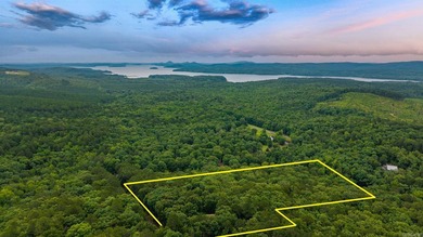 Nestled on 5 private wooded acres, this custom log home offers - photo 48