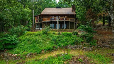 Nestled on 5 private wooded acres, this custom log home offers - photo 50