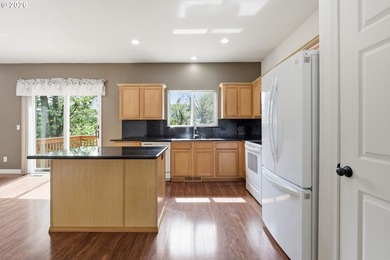 Welcome to this well maintained former model home in the - photo 6