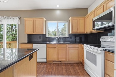 Welcome to this well maintained former model home in the - photo 7