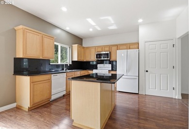 Welcome to this well maintained former model home in the - photo 8