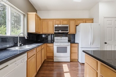 Welcome to this well maintained former model home in the - photo 9