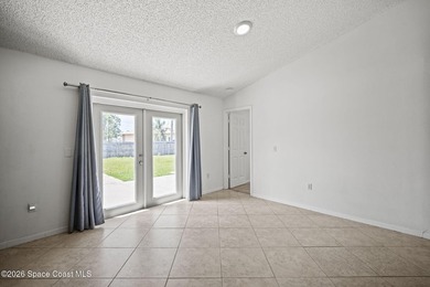 Situated on a quiet street in a desirable Southeast Palm Bay - photo 11