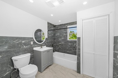Beautifully renovated legal two-family home offering updates - photo 14