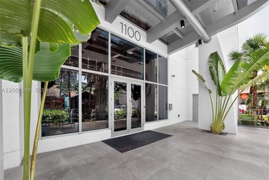 This 2/2 condo is in a vibrant area of the city and within - photo 3