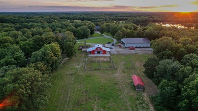 423+/- acre estate in Harrisburg, MO featuring a 27-acre stocked - photo 12