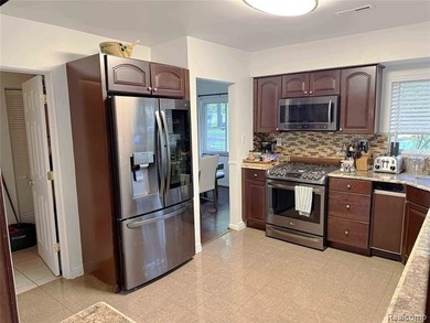 Welcome to 1475 Avondale, a spacious ranch home ideally located - photo 4