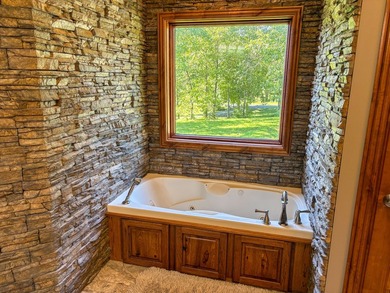 423+/- acre estate in Harrisburg, MO featuring a 27-acre stocked - photo 26
