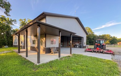 423+/- acre estate in Harrisburg, MO featuring a 27-acre stocked - photo 40