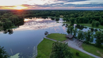 423+/- acre estate in Harrisburg, MO featuring a 27-acre stocked - photo 45