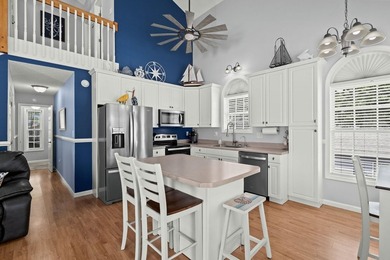 This spacious 3 Bedroom 2.5 Bath raised 1.5 story beach house is - photo 12