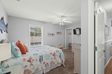 This spacious 3 Bedroom 2.5 Bath raised 1.5 story beach house is - photo 22