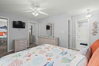 This spacious 3 Bedroom 2.5 Bath raised 1.5 story beach house is - photo 23