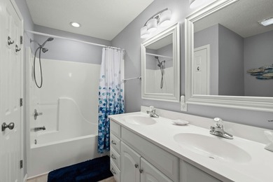 This spacious 3 Bedroom 2.5 Bath raised 1.5 story beach house is - photo 24