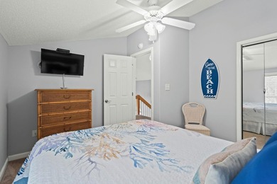 This spacious 3 Bedroom 2.5 Bath raised 1.5 story beach house is - photo 29