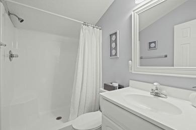 This spacious 3 Bedroom 2.5 Bath raised 1.5 story beach house is - photo 30