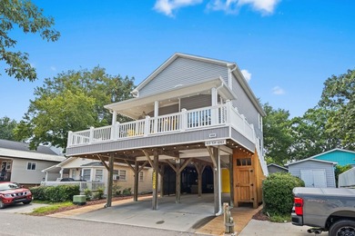 This spacious 3 Bedroom 2.5 Bath raised 1.5 story beach house is - photo 34