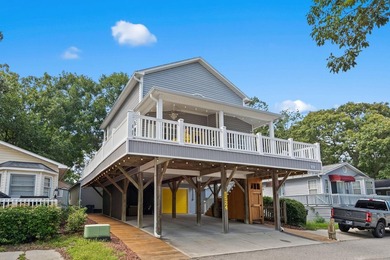 This spacious 3 Bedroom 2.5 Bath raised 1.5 story beach house is - photo 36