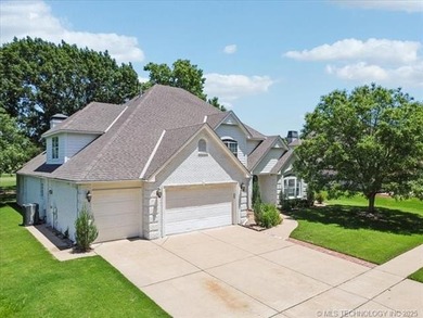 Beautifully Updated Full Brick Home backing to the 16th Hole of