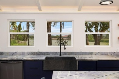 Stunning lakefront home sitting on over an acre in the exclusive - photo 13
