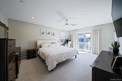 Just over one block from the beach, this fully renovated home - photo 13