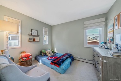 Just over one block from the beach, this fully renovated home - photo 19
