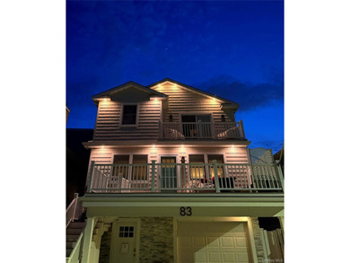 Just over one block from the beach, this fully renovated home - photo 26