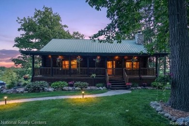 Welcome to this meticulously maintained 2,400 sq. ft. log home - photo 4