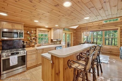 Welcome to this meticulously maintained 2,400 sq. ft. log home - photo 6