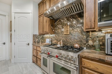 Nestled on the 13th hole, this exceptional golf course estate - photo 17