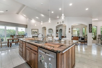 Nestled on the 13th hole, this exceptional golf course estate - photo 18