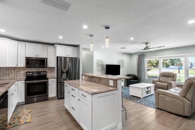 Completely transformed and move-in ready with NO HOA! This - photo 5