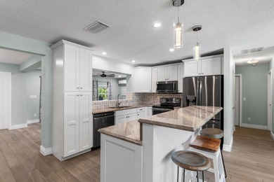Completely transformed and move-in ready with NO HOA! This - photo 8
