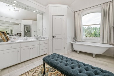 Nestled on the 13th hole, this exceptional golf course estate - photo 39