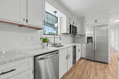 This beautifully remodeled 4- bedroom, 2 -bathroom home in the - photo 6