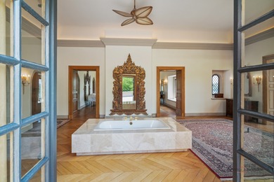 Experience the distinctive charm of this English Manor-an