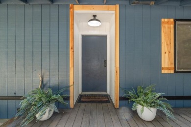 Tucked beneath towering redwoods on a full acre, this 2-bedroom - photo 2