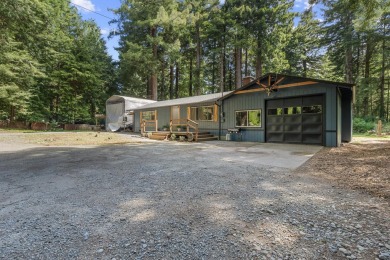 Tucked beneath towering redwoods on a full acre, this 2-bedroom - photo 3
