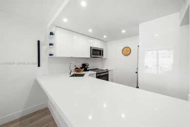 Experience South of Fifth living at its finest in this