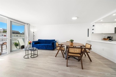 Experience South of Fifth living at its finest in this