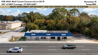 This three-unit, income-producing neighborhood retail center - photo 1