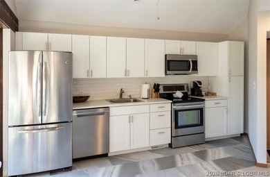 Experience resort-style living in this stunning condo perfectly - photo 14