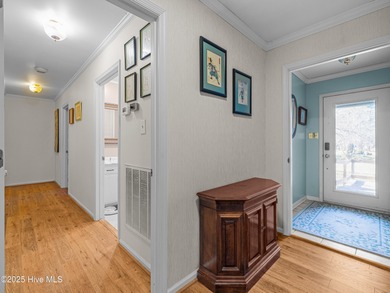 Welcome to 6101 Albatross Drive, located in the beautiful gated