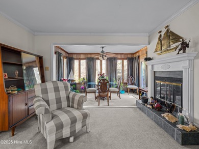 Welcome to 6101 Albatross Drive, located in the beautiful gated