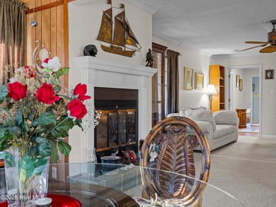 Welcome to 6101 Albatross Drive, located in the beautiful gated