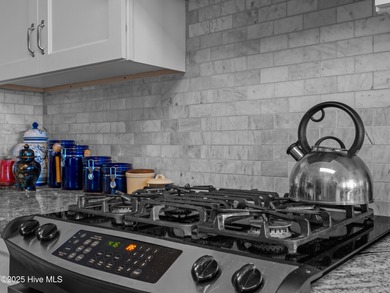 Welcome to 6101 Albatross Drive, located in the beautiful gated